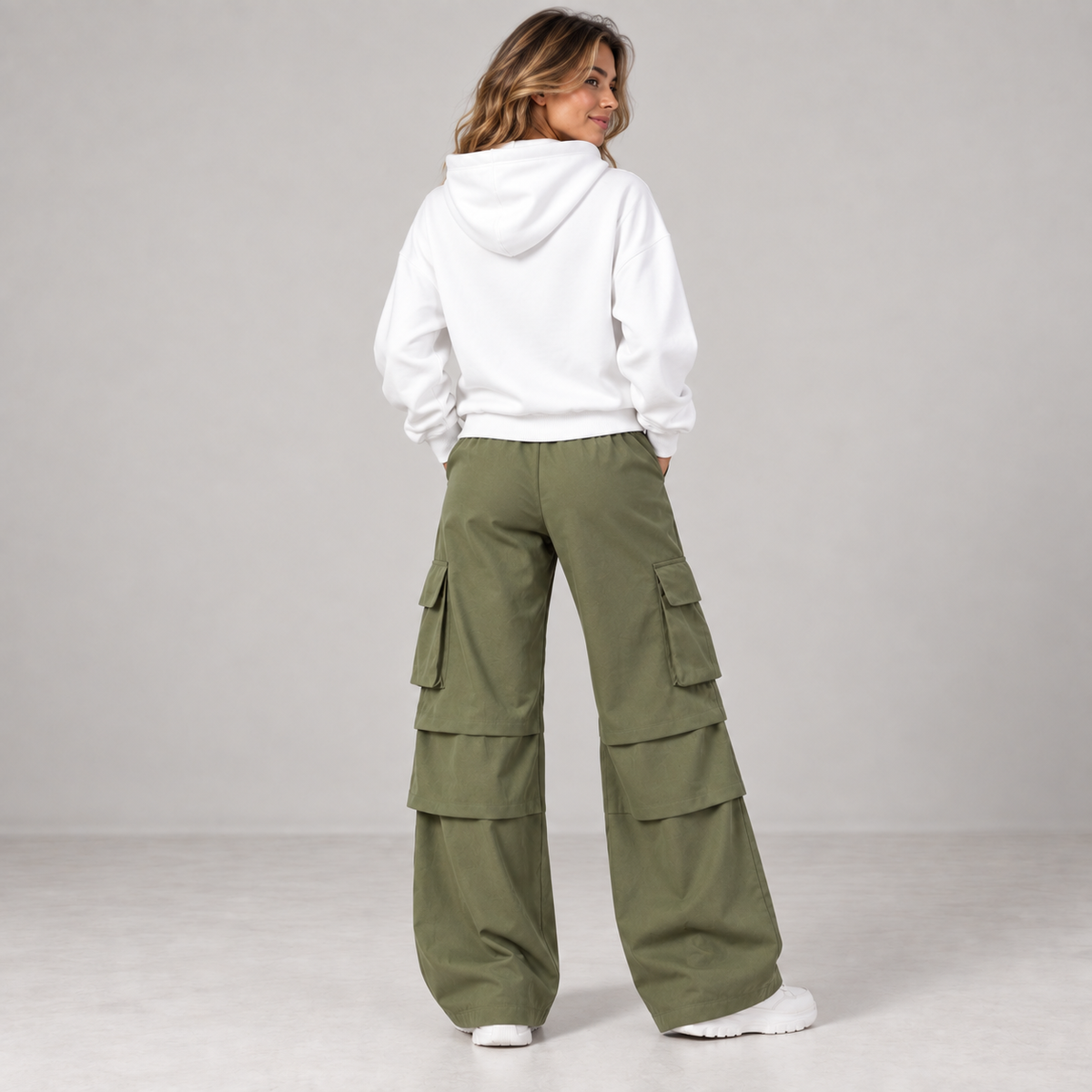 Women's hoodie and olive cargo pants set back view