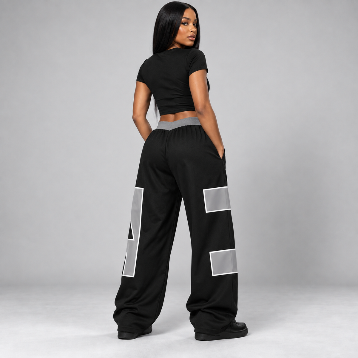 Back view of gray-black urban graphic two-piece pants set