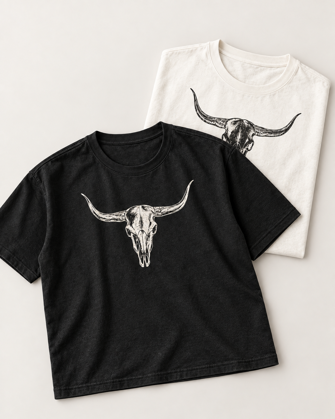 Bull Skull black and ivory tee set, close angled view